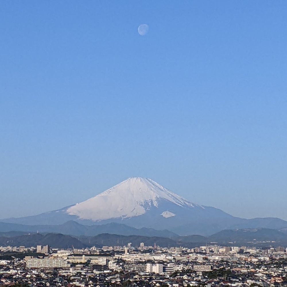 Moon rising over Mount Fuji